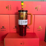 The Stanley 1913 x KAROL G 40oz Quencher H2.O FlowState Tumbler