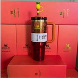 The Stanley 1913 x KAROL G 40oz Quencher H2.O FlowState Tumbler
