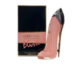 Pink high-heeled shoe and 'God Girl Blush' perfume bottle with packaging on a white background